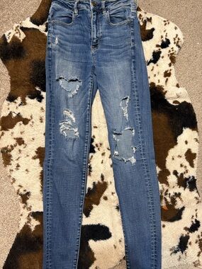 American Eagle Outfitters Medium Blue Ripped Skinny Jeans